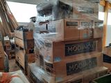 many boxes stacked on top of each other in a room