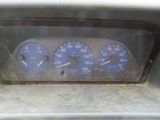 a close up of a car dashboard with gauges and numbers