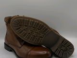 men ' s brown leather boots on a white background