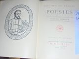 an open book with a drawing of a man holding a pipe