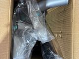 a box with a blow dryer and other items in it
