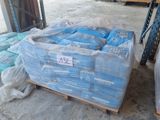 a pallet full of bags of water sitting on a pallet