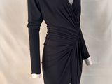 a mannequin dress with a floral design on the shoulders