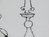 drawing of a candle with a face on a white plate