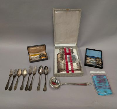 a box of silverware and a case of silverware
