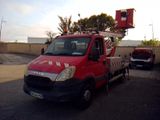 a red truck that is parked in a parking lot