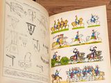 an open book with a picture of a horse drawn carriage