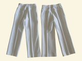 pair of white pants on a white background with a yellow background