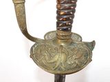 a close up of a sword on a white background