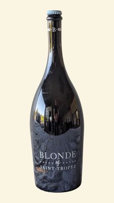 a bottle of wine that is sitting on a table