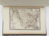 an open book with a map of the united states on it