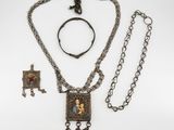 an assortment of jewelry including a necklace, bracelet, and ring