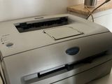 an image of a printer sitting on a desk