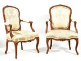 pair of louis xv style carved walnut armchairs