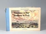 an old book with a picture of a dog on the cover