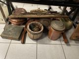 many pots and pans that are on the floor