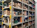 many boxes and boxes on the shelves in the warehouse