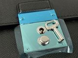 a close up of a lock on a piece of luggage