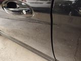 a close up of a door handle on a car