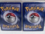 two packs of pokemon cards with a poke poke poke poke poke poke poke poke poke poke poke poke poke poke