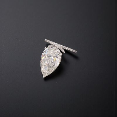 a close up of a diamond on a black surface