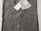 a close up of a shirt with a tag on it