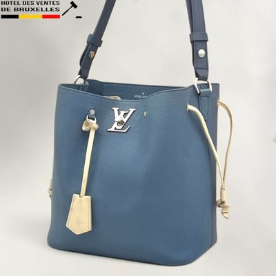 Sac seau en cuir bleu « Louis Vu Vu » avec finitions dorées