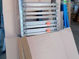 a lot of boxes stacked on top of each other in a warehouse