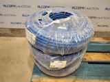 two blue hoses stacked on top of each other on a pallet