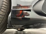 a close up of a car ' s bumper with a sticker on it