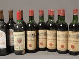 six bouteilles de vin sont alignées sur une table