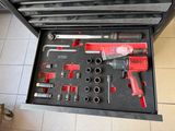 a tool box with tools in it on the floor