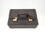 leather briefcase on white background with clippings on the handle