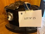 une pancarte indiquant « lott n 25 » sur une machine à café