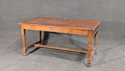 a small table with a wooden top on a gray background