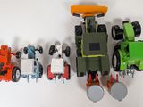 a lot of toy vehicles that are lined up together