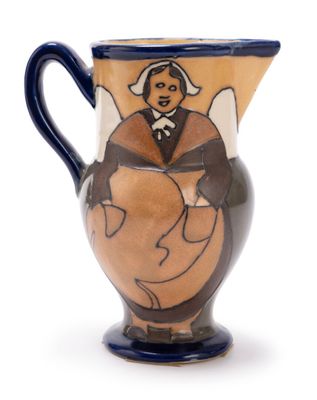 an image of a ceramic pitcher with a woman on it