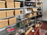 a room with a lot of boxes and boxes on the shelves