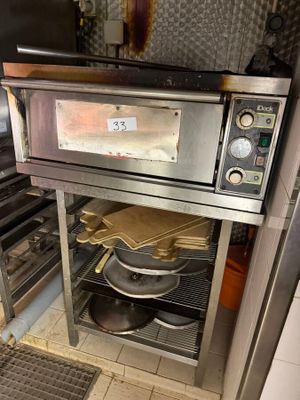 an oven that has a lot of food inside of it