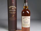 an image of a bottle of whisky next to a cardboard box