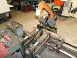 a machine that is working on a piece of metal