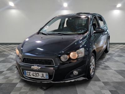 a picture of a car that is parked in a garage