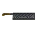 une photo d'un clavier d'ordinateur muni d'un câble