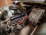 an old car engine in the back of the car