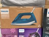 two boxes of philips irons on the table