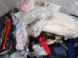 a bag full of items that are sitting on the floor