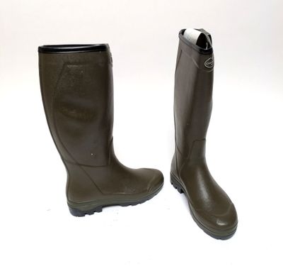 a pair of boots that are on a white surface