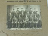 an old photo of a group of men in uniform