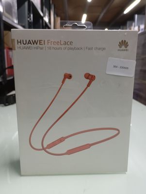 the box of a pair of headphones sitting on top of a table