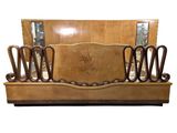 a wooden bench with a mirror on top of it